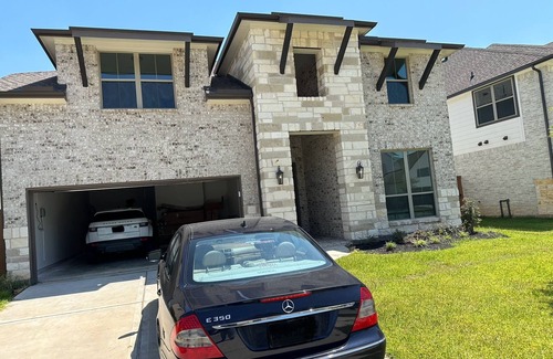 Katy House | Luxury, spacious, 5-bedroom home: central air, WiFi, and resort-style amenities