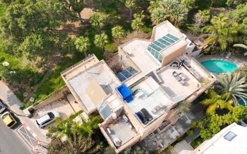 Herzliya Pituach Villa | Luxury villa with a heated pool, Jakuzi and a sea view 70m from the beach
