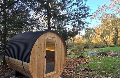 Fertility Cottage | Luxury Waterfront Cottage with Wood Burning Fireplace + Hot Tub + Backyard Sauna