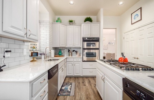 Val Vista Lakes House | Luxury Waterfront Home w/GAME ROOM & HEATED POOL