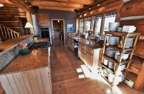 Suttons Bay House | Luxury Waterfront Log Home 15 min from Traverse City w/Dock