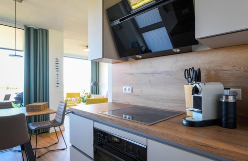 Marienleuchte Apartment | Lykke vacation apartment - pure sea view. Sauna. Family-friendly.