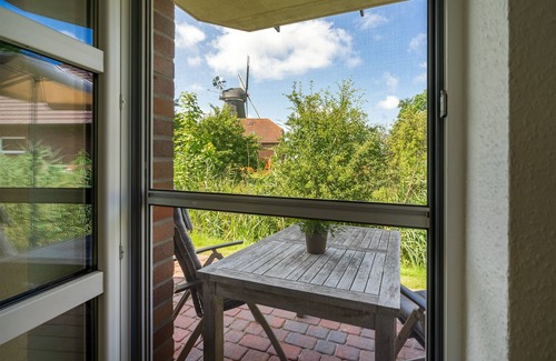 Greetsiel Apartment | Mühlenblick 02 - Moderne Ferienwohnung mit Blick auf die Zwillngsmühlen