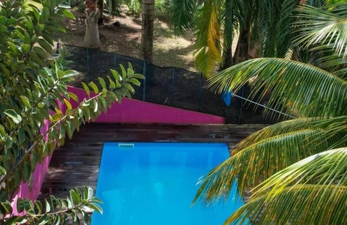 Pointe-Noire RV Rental | MABOUYA Creole bungalow sleeps 2 (a clic clac sleeps an additional 2)