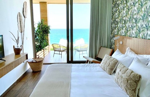 Kfardebian House | Majestic Palm: Beachfront Exotic Room in Batroun