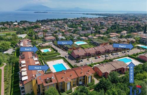 Rivoltella Apartment | Marriott Paradise Lake View in a 5 pools exclusive residence DesenzanoLoft Official Partner Homes & Villas by Marriott Bonvoy