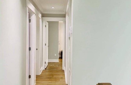 Queensborough House | Master bedroom with private bathroom in New home