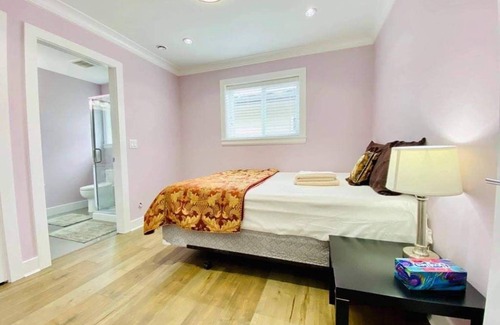 Queensborough House | Master bedroom with private bathroom in New home
