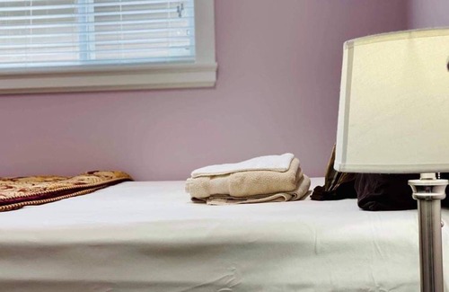 Queensborough House | Master bedroom with private bathroom in New home