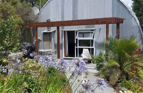 Whangaripo Ski Chalet | Matakana peaceful rustic retreat,soak in the secluded hot spa.