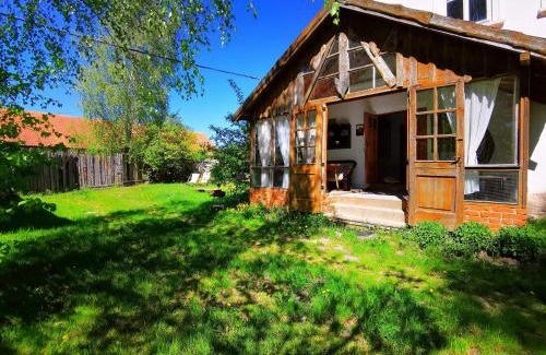 Wydminy House | Mazurskie Klimaty - niezależny, ogrodzony apartament z werandą