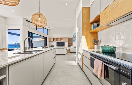 Malua Bay House | McKenzies Beach House - New Home on Beach with Views and Heated Swimming Pool