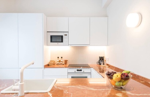 El Guinardo Apartment | Mediterranean home with 4 bedrooms and 3 bathrooms