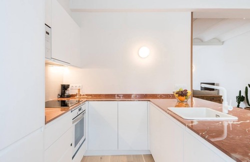 El Guinardo Apartment | Mediterranean home with 4 bedrooms and 3 bathrooms