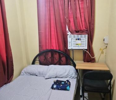 Batangas City Apartment | Mel's Place Batangas Unit 8 Two-Bedroom House w Free Parking WIFI Netflix Smart TV Fit to 4 Adults or kids