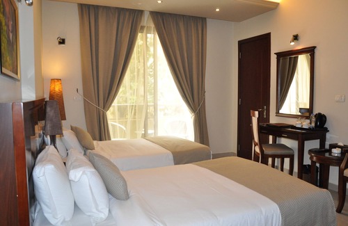 Hamra Hotel | MidTown Hotel & Suites