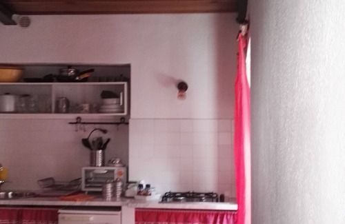 Marciana Apartment | Mini house of magnolias in the center of the medieval village of Marciana