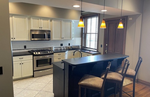 Midtown House | Minutes from Downtown! Family-sized Townhome in Blackstone