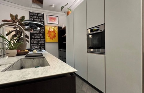 Mission District Apartment | Mission jewel box filled with art and classic furniture, Garage parking & AC