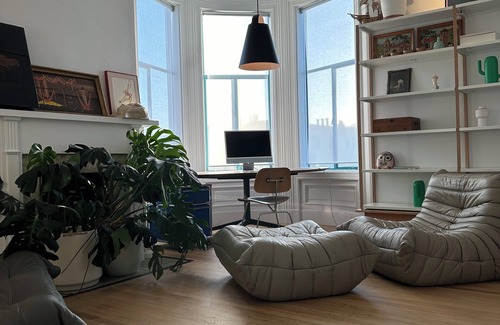 Mission District Apartment | Mission jewel box filled with art and classic furniture, Garage parking & AC