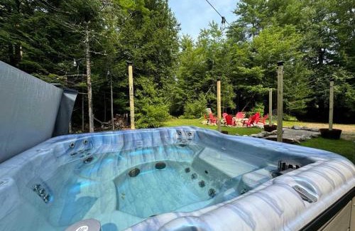 Conway House | Mitten Pines Cabin Hot Tub Fire Pit