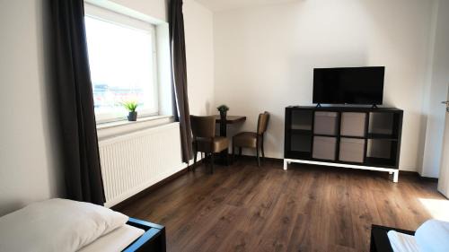 Celle Apartment | Mivano-Apartments WiFi Küche NETFLIX