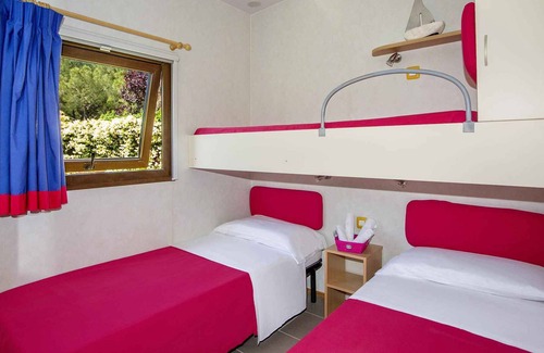 Le Rocchette House | Mobilehome with garden, air conditioning and 150 meters from the sea