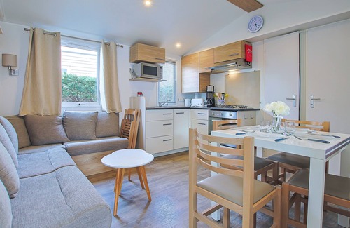 Saint-Jean-de-Monts RV Rental | Mobile Home 'Mobilhome Camping Bois Masson' with Shared Pool and Private Terrace