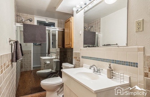 Northwest Arvada House | Mod-Chic Retreat Lux Kitchen Game Rm Patio