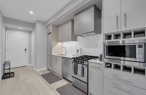 West Springs Condo | Modern 2BR Suite with Underground Parking in SW Calgary
