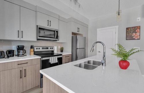 Southwest Calgary House | Modern 2BR Townhome in Belmont | AC & Parking