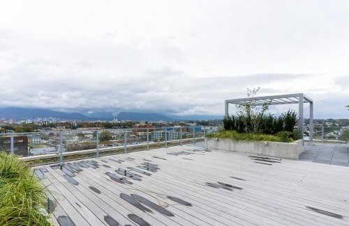 Mount Pleasant Apartment | Modern 3BR Condo with Rooftop, Gym and Parking near Skytrain