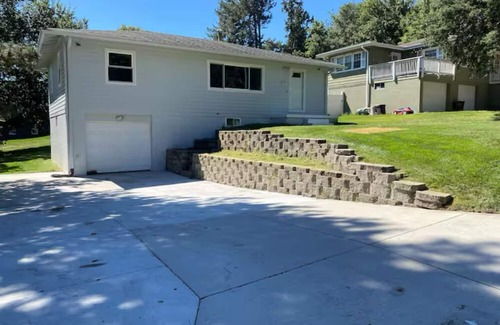 Omaha House | Modern 4BR 2BA house with 2 living rooms- 50” TVs - wifi Pay Monthly