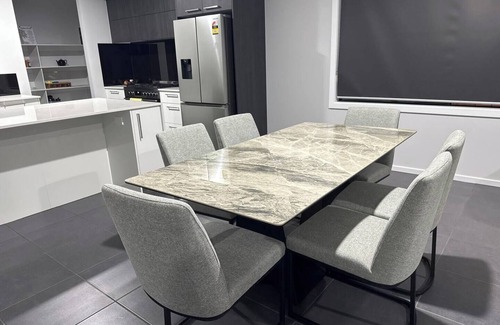 Rockbank House | Modern 4BR Retreat with Pool, Gym, Wi-Fi & Garage – Near Shops