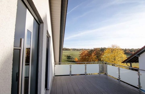 Voehl Apartment | Modern and bright vacation apartment with Hutewald view