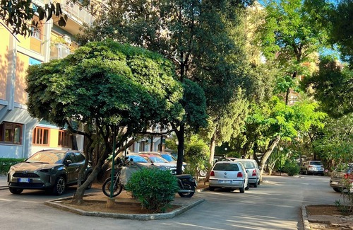 Palermo Apartment | Modern apartment in the center with private parking space and communal garden
