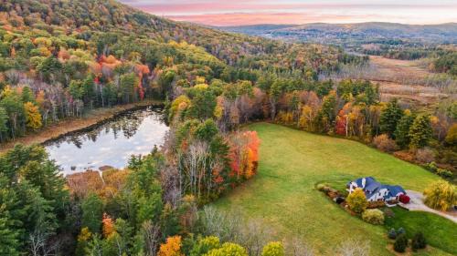 Stockbridge House | Modern Berkshires Farmhouse w Porch Fireplace Views Beaver Creek by AvantStay