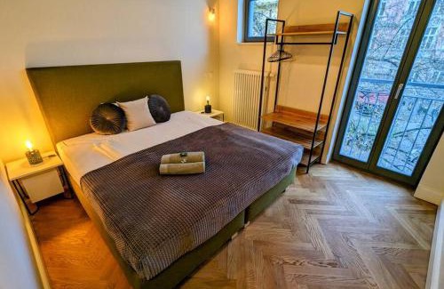 Friedrichshain-Kreuzberg Apartment | Modern building with vertical garden & 2 bedrooms