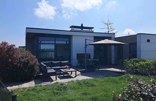 Olburgen House | Modern chalet with fenced garden, sauna, outdoor pool and river view in Olburgen