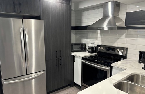 Kitchener Apartment | Modern, clean, bright two bedroom lower level look out duplex with large windows