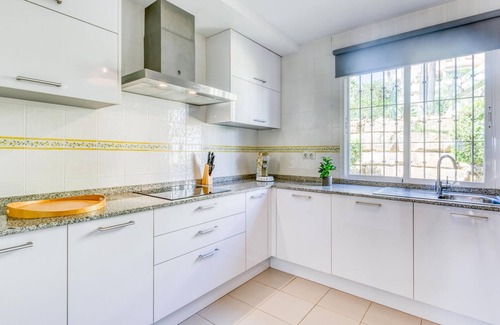 Estepona Apartment | Modern comfort in Estepona: terrace, pools, AC, and Wi-Fi