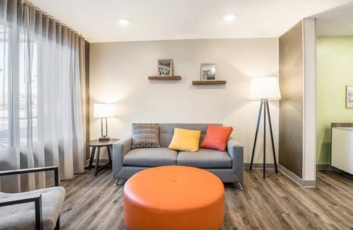 Bellflower Hotel | Modern Comforts in a Charming Locale! Full Kitchen, Pets Allowed, Free Parking!