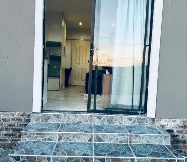 King William's Town Apartment | Modern & Cosy Apartments with Scenic Sunset Views