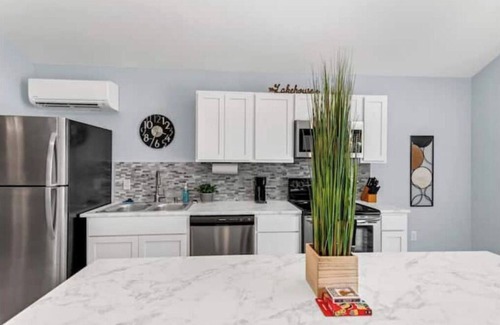 Morrilton House | Modern Couples Retreat . Lakefront . Private Dock