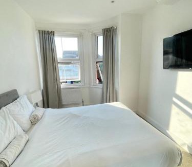 Edgware House | Modern Double Bedroom with Marble private bathroom