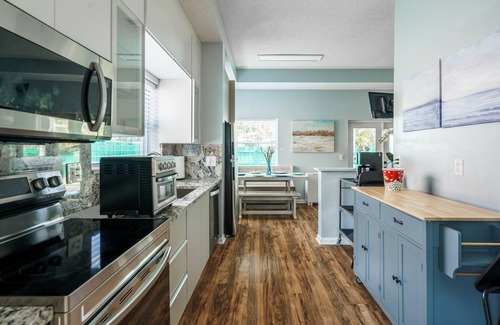 Sandalfoot Cove House | Modern Family Home w/Cinema , Close to Beach!
