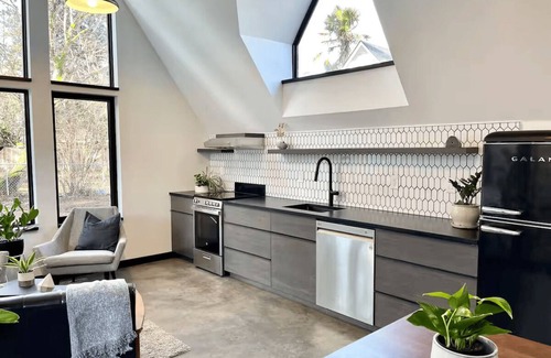 Cully House | Modern Home with Cedar Sauna & Outdoor Patio
