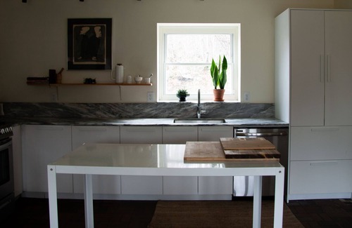 Accord House | Modern house in the woods with a pond