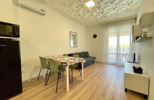 Porto Santa Margherita Apartment | Modern flat with pool view balcony