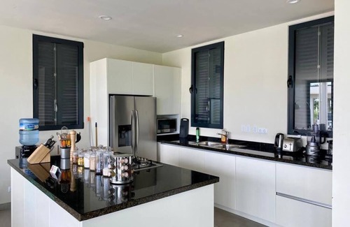 Noord Villa | Modern luxury mansion in colonial style